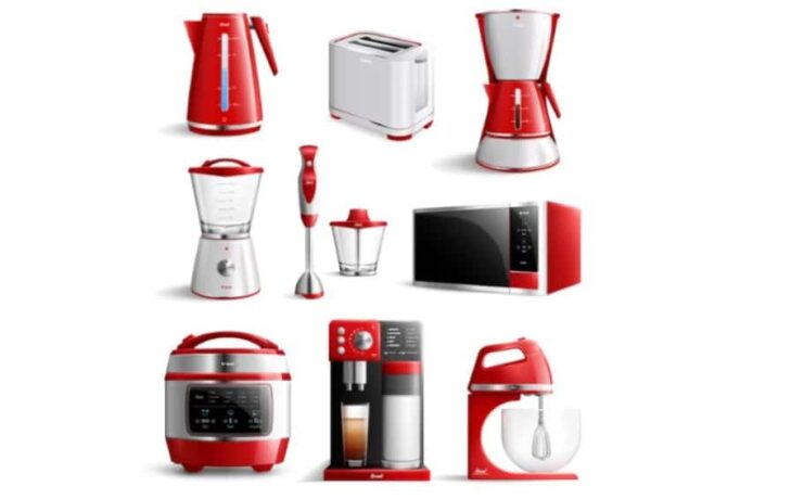 vários eletrodomésticos vermelhos em um fundo branco