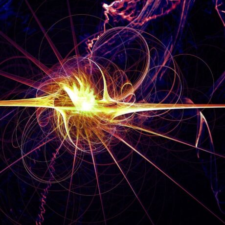 uam imagem de pontos de luz amarelo, roxo e azul misturados