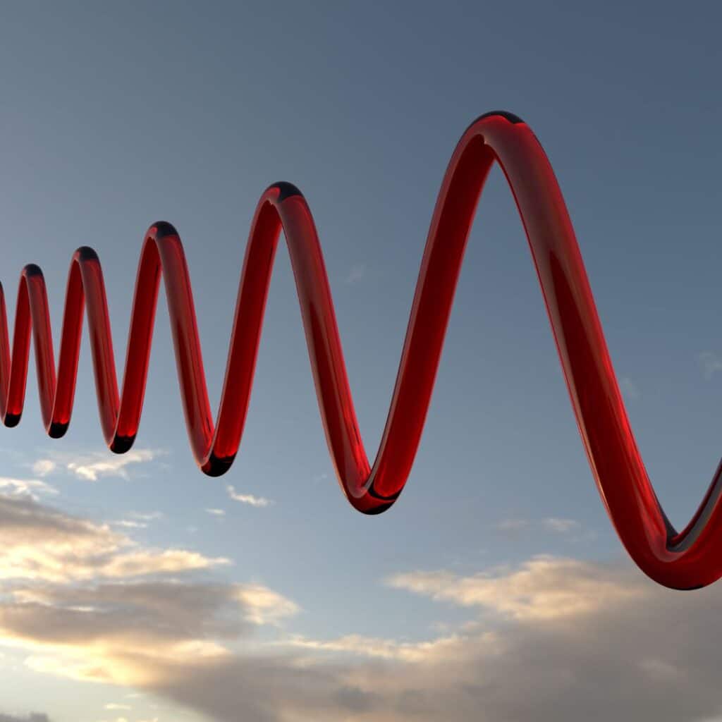 uma onda senoidal em um fundo de céu com nuvens