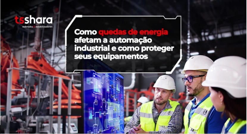 Engenheiros discutindo automação industrial com painel digital