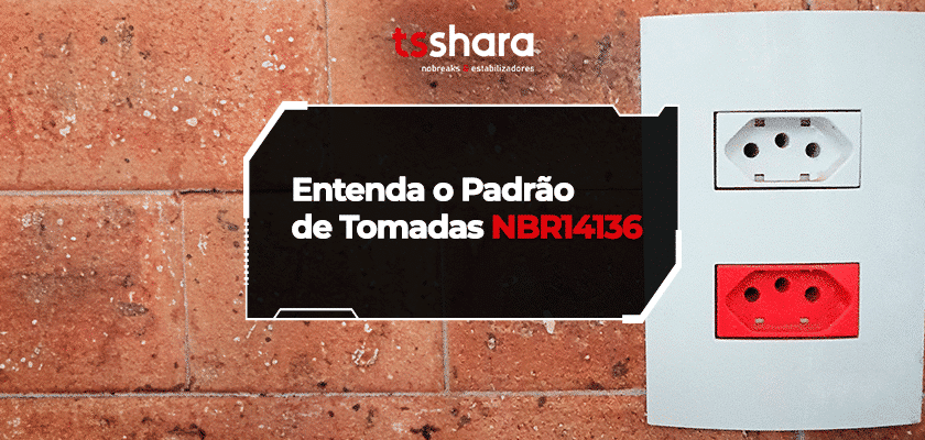 Tomadas padrão NBR 14136 instaladas em parede de tijolos, com destaque informativo.