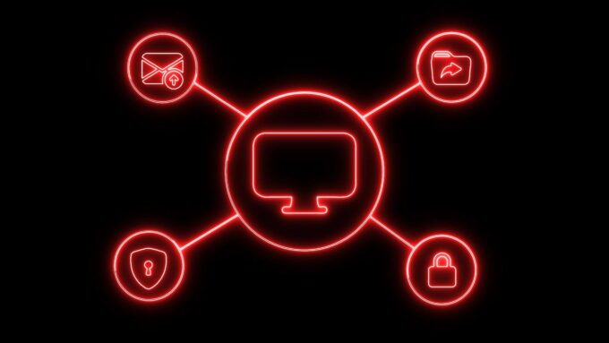 Ilustração em fundo preto com um computador ao centro, conectado a ícones de segurança, arquivos, e-mail e proteção por senha, todos iluminados em vermelho.