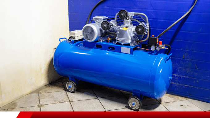 Compressor de ar azul em ambiente industrial.